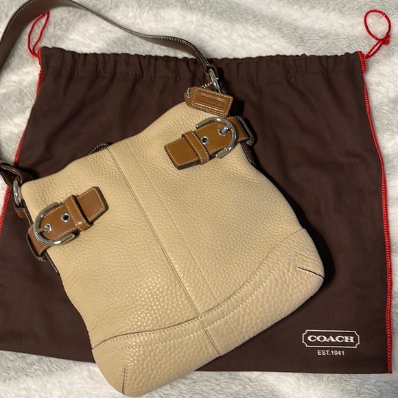 Coach Handbags - COACH  tan and brown leather handbag. EUC